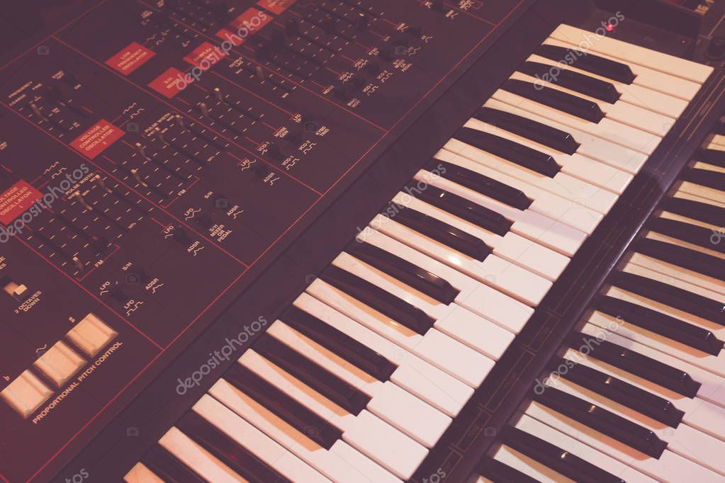 Used keyboards and small synths arranged in a row