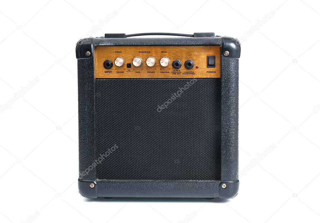 Used electric guitars on stands in a small room